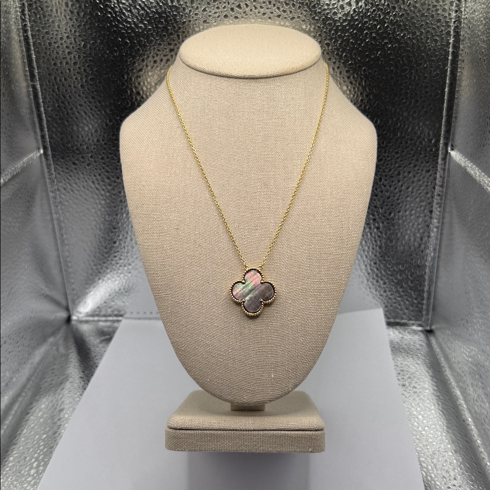 Elegant Gold and Black Clover Pendant Necklace